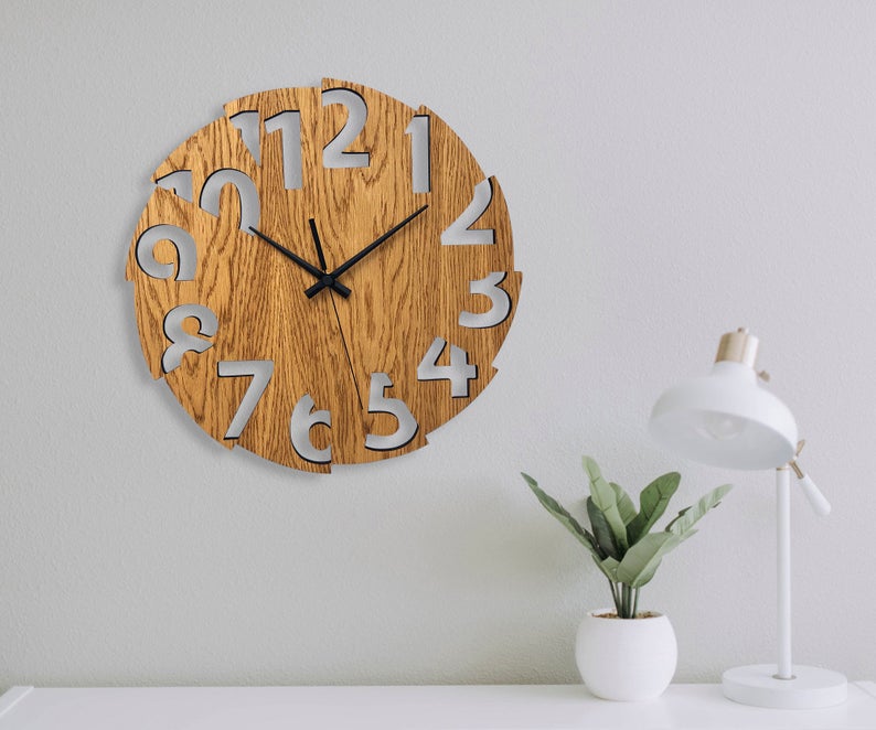 ساعت دیواری طرح جدید و با دو رنگ و در دو جنس مختلف